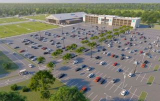 3D rendering of aerial view of Destination KP mixed-use project showing parking lot, office buildings, indoor and outdoor sports areas