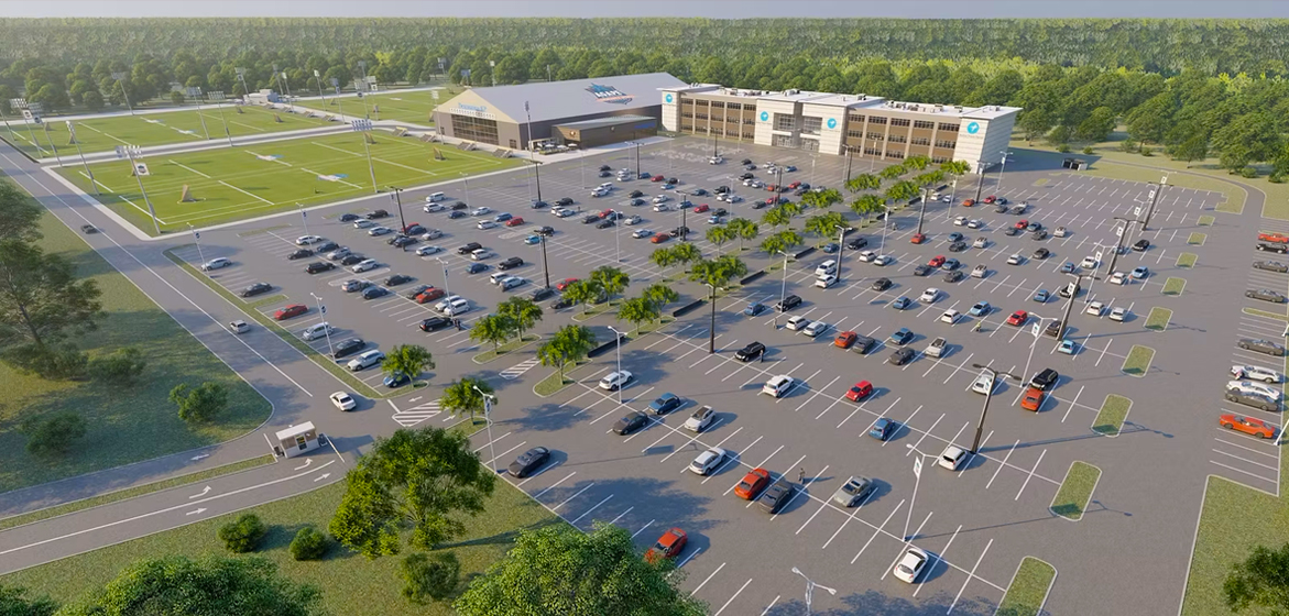 3D rendering of aerial view of Destination KP mixed-use project showing parking lot, office buildings, indoor and outdoor sports areas